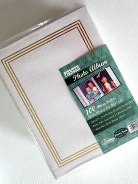 PIONEER White Photo Album with Gold Border
100 photos up to 4 x 6"
